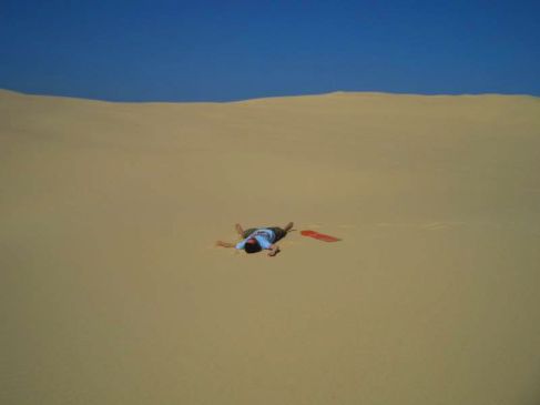 Sandboarding in Stockton during a 4000km road trip up the East Coast of Australia.