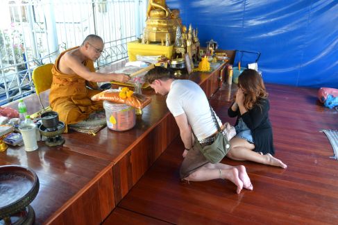 Being blessed by a monk with my good friends Allan and FF in Bangkok.