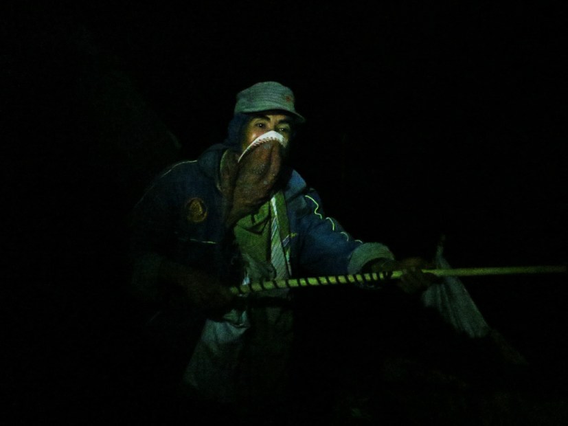 a-pilgrim-with-a-net-inside-the-crater