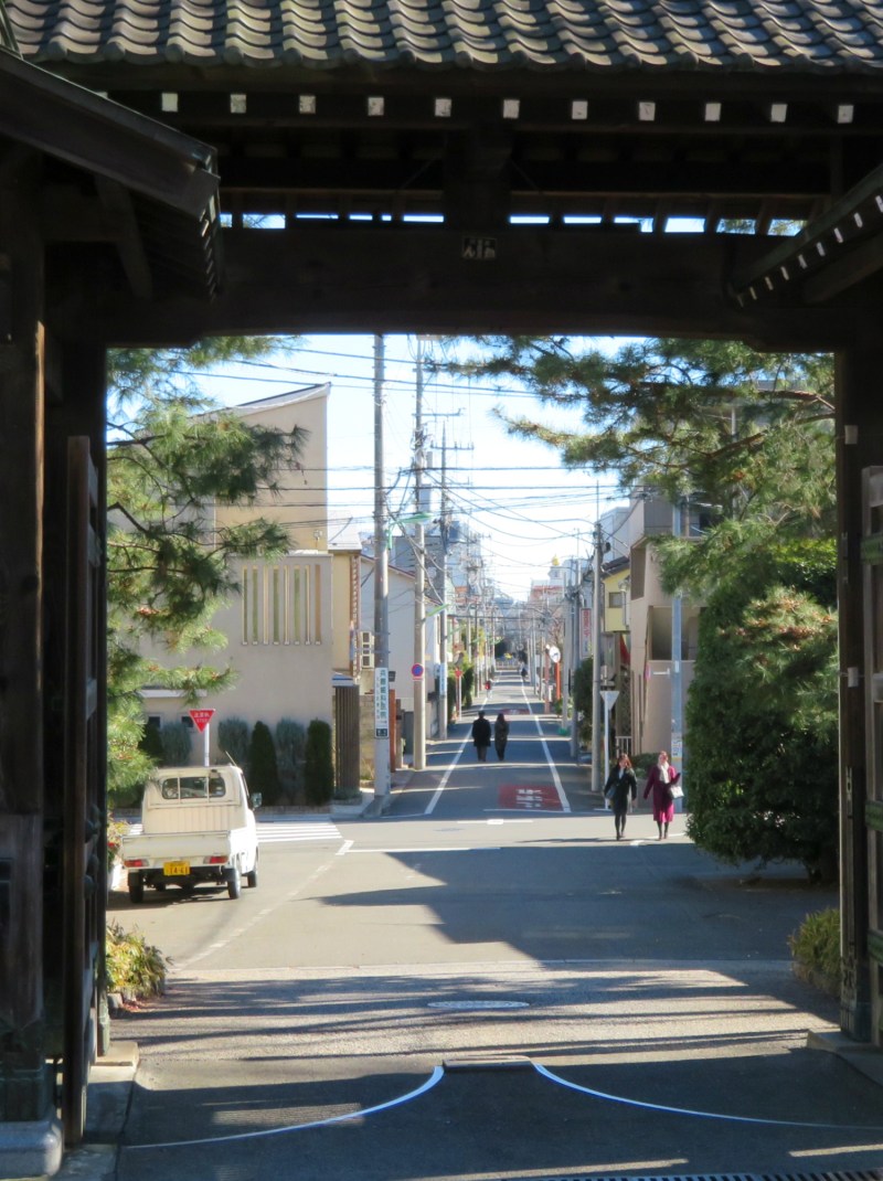 Temple gates Tokyo sun