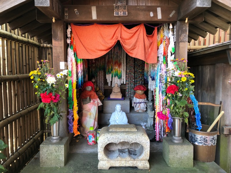 cute statues colour japanese shrine